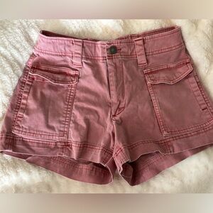 Pink high rise extra small shorts.